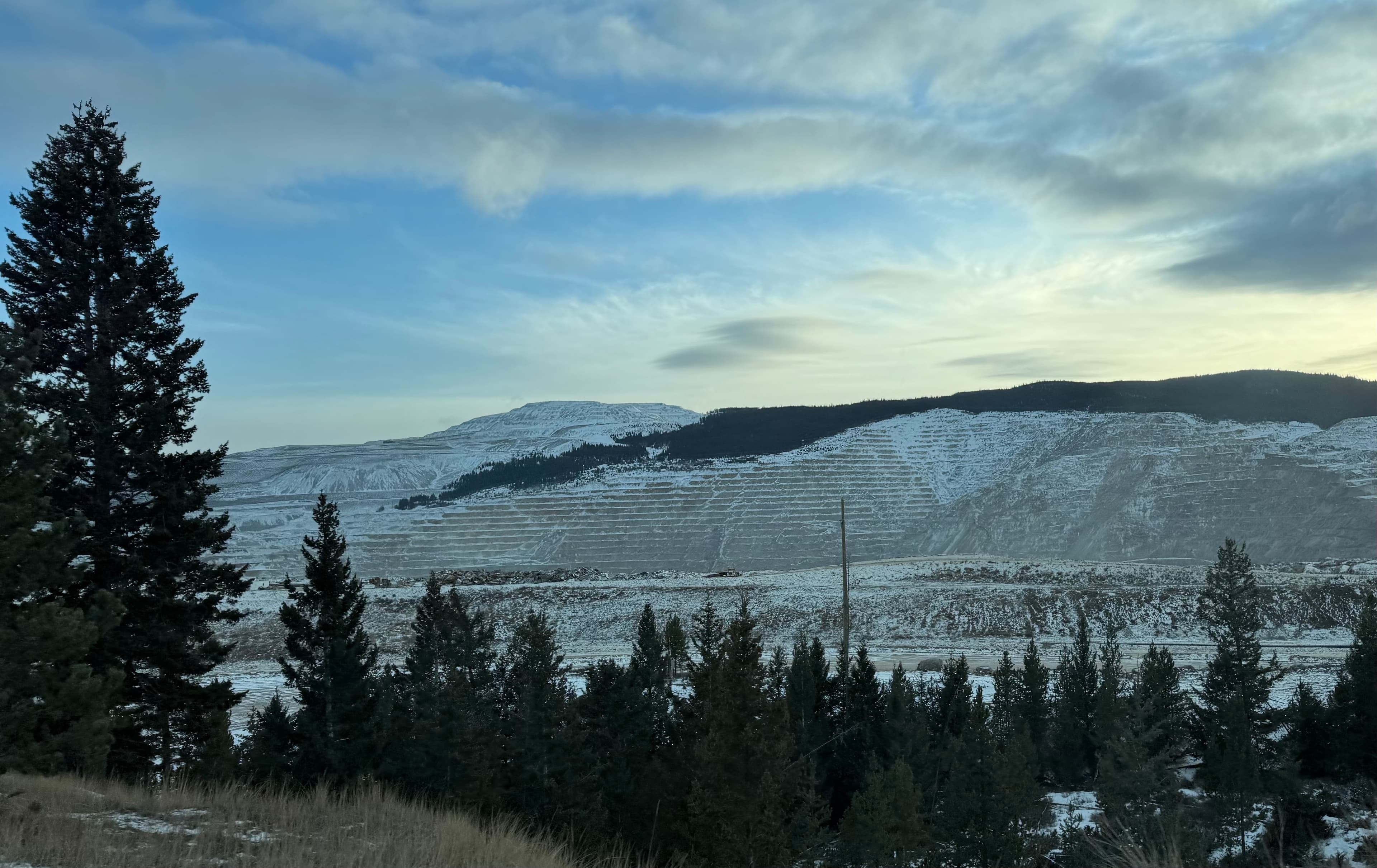 Mining operations and heavy equipment at a resource extraction site